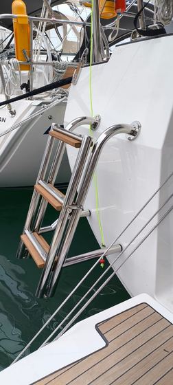 Stainless swim ladder with teak treads — 1