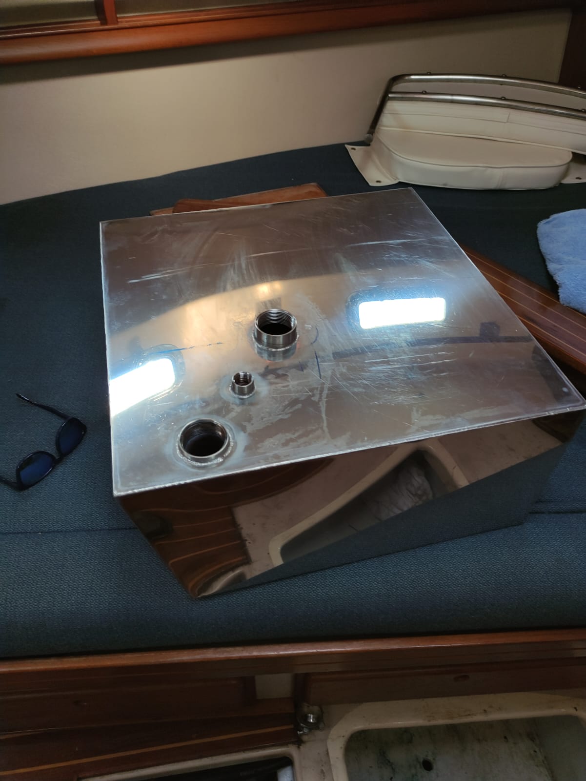 Polished 316L stainless water tank fitted on board