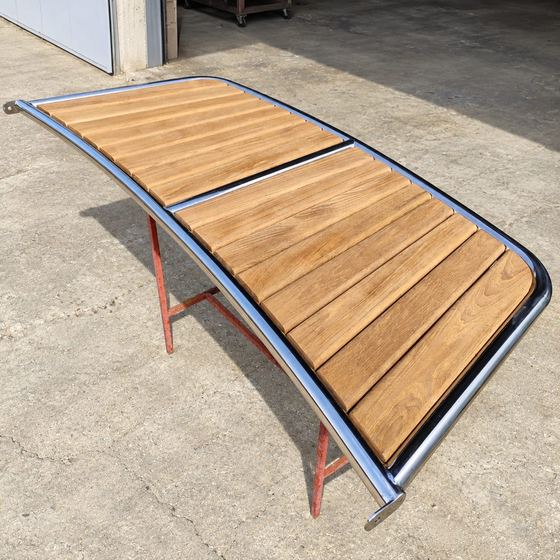 Teak-topped swim platform in the workshop yard